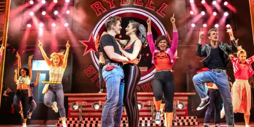 Who starred in the Grease The Musical cast? cover photo on Stagedoor